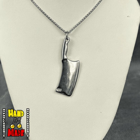 Handmade Hatchet Anime Necklace featuring silver metal hatchet charm on a silver chain necklace.