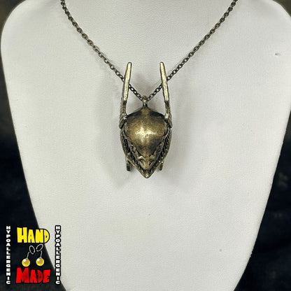 Handmade Golden Warrior Helmet Gaming Necklace featuring detailed gold helmet charm on a gold chain necklace.