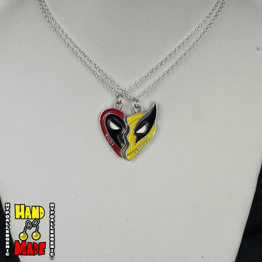 Handmade Masked Duo Friendship Necklace featuring mismatched metal mask charms on a silver chain necklace.